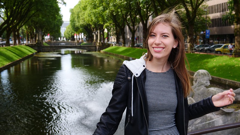 Enjoying a walk along Königsallee in Düsseldorf, Germany with a smiling That Backpacker Audrey Bergner loving be there