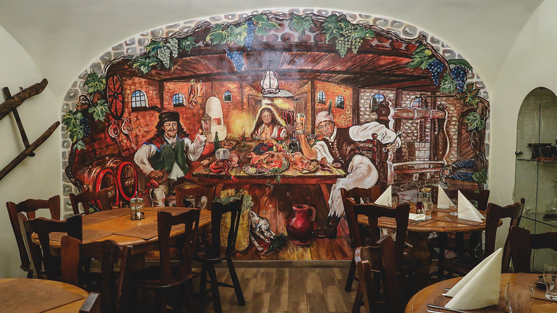 Enjoying Hungarian food at Labirintus Restaurant with its rustic interior and charm Enjoying Hungarian food at Labirintus Restaurant with its rustic interior and charm