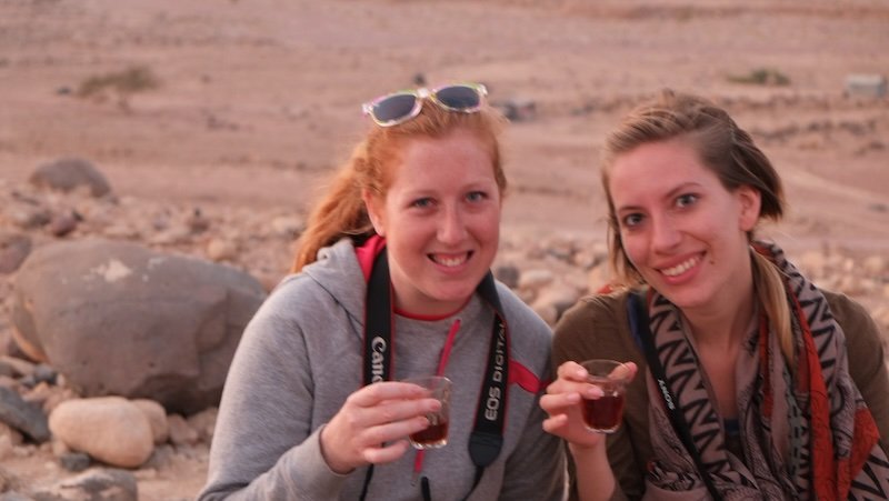 Enjoying traditional Bedouin Jordanian tea in the desert is That Backpacker Audrey Bergner and friends Enjoying traditional Bedouin Jordanian tea in the desert is That Backpacker Audrey Bergner and friends