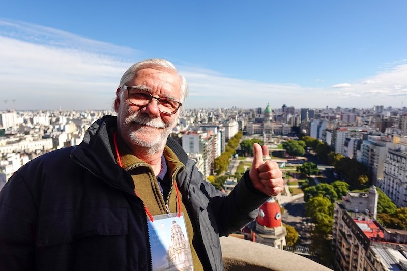 Enjoying views of Buenos Aires from a high vantage point is Audrey Bergner That Backpacker's father Daniel with smiles and thumbs up 
