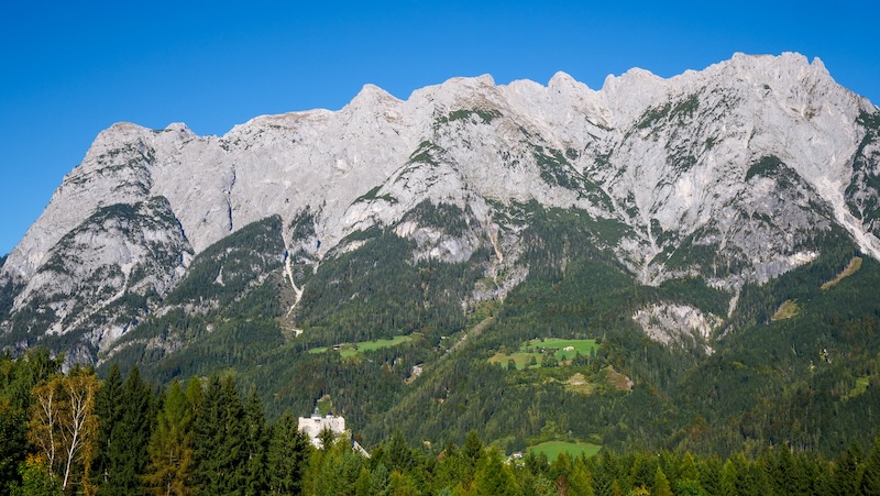 Epic mountain views dominating the fortress castle in Werfen, Austria 