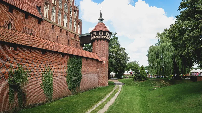 Exploring Malbork Castle in Poland with exterior views and features