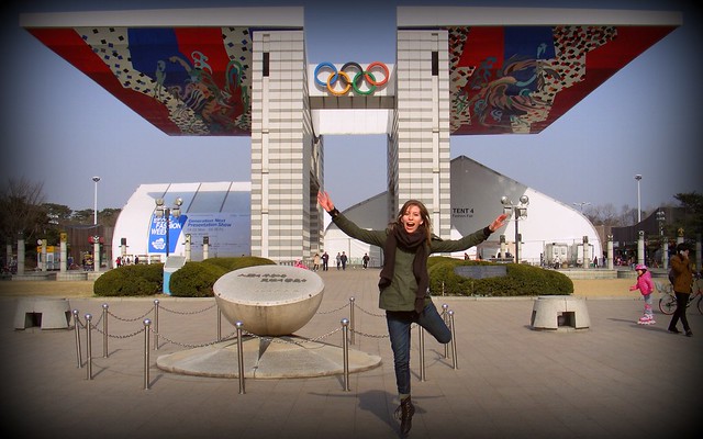 Exploring Seoul while working as an English teacher in Korea visiting Olympic Park with That Backpacker Audrey Bergner jump posing