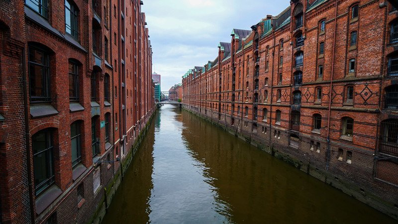 Exploring the historic warehouse district with its red brick buildings and canals is the top thing to do on foot for the day in Hamburg, Germany Exploring the historic warehouse district with its red brick buildings and canals is the top thing to do on foot for the day in Hamburg, Germany
