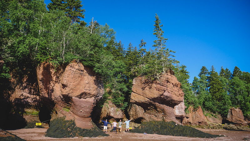 Family visit to Hopewell Rocks, New Brunswick where we look like specs compared to the unique geography 