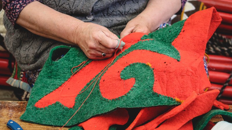 Felt decorations for the interior of the yurt being made by hand in Kyrgyzstan