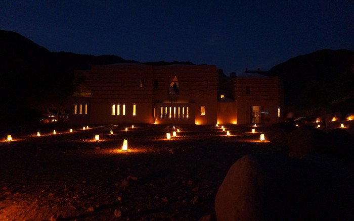 Feynan Ecolodge lit by candlelight at night in Jordan was a unique place to stay that was very eco friendly 
