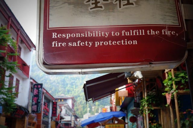 Fire safety sign in China with it saying responsibility to fulfill the fire, fire safety protection
