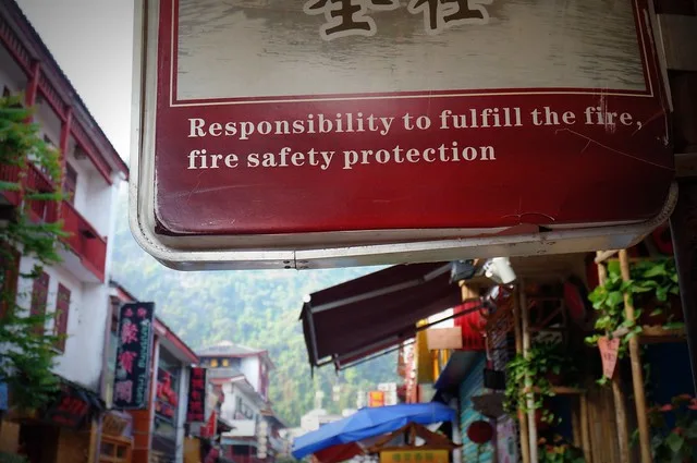 Fire safety sign in China with it saying responsibility to fulfill the fire, fire safety protection