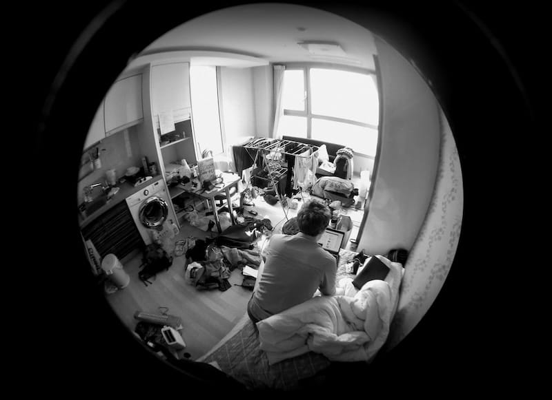 Fisheye view of Korean apartment getting ready to leave by packing up stuff