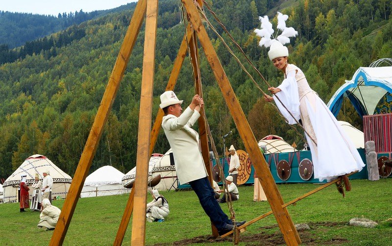 Folk Festival in the Kyrchyn Jailoo for the World Nomad Games with a wedding wooden swing being a unique thing to do for visitors 