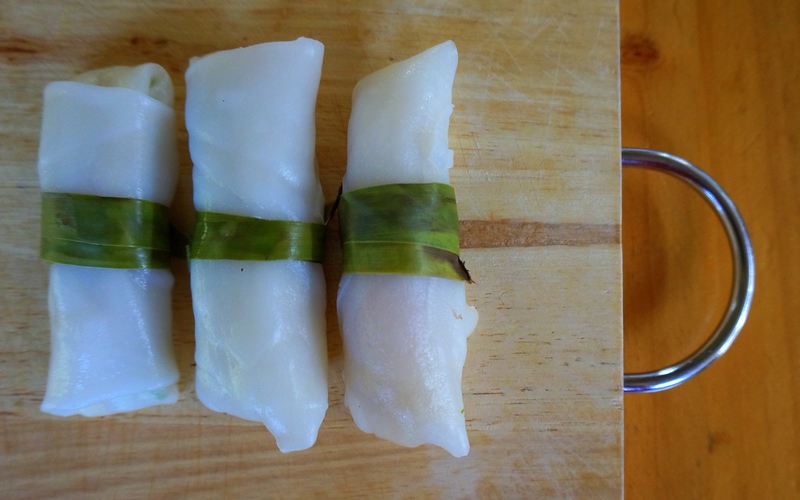 Fresh spring rolls wrapped in strips of bamboo leaf that we prepared in Chiang Mai 