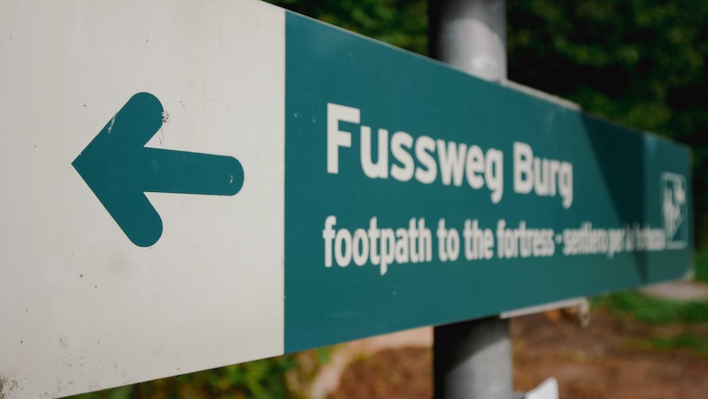Fussweg Burg footpath to the fortress sign in Werfen, Austria 