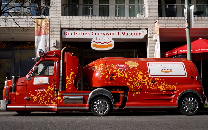 Getting to the Deutches Currywurst Museum where a big currywurst mobile was parked outside the entrance in Berlin