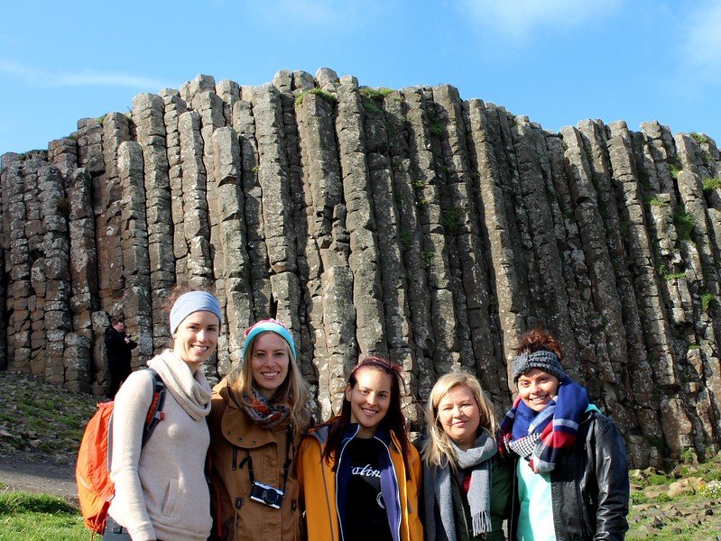 Giant's Causeway in Northern Ireland with all of the girls on the trip including That Backpacker Audrey Bergner and friends and family together posing