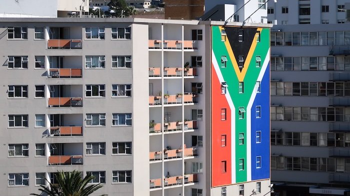 Giant South African flag painted on an apartment building in Cape Town, South Africa 