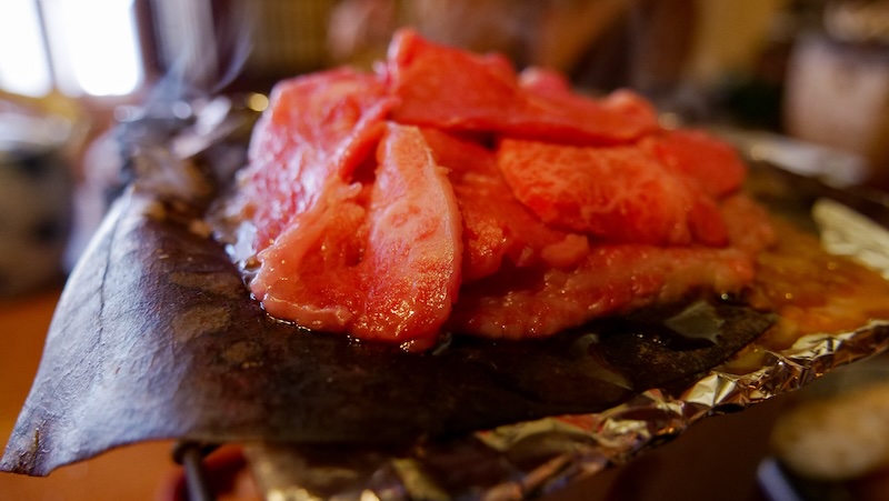 Grilled hida beef macro views being cooked in Takayama, Japan Grilled hida beef macro views being cooked in Takayama, Japan