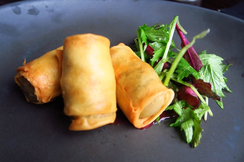 Haggis, neeps and tatties deep-fried spring rolls as a tasty snack in Edinburgh, Scotland 