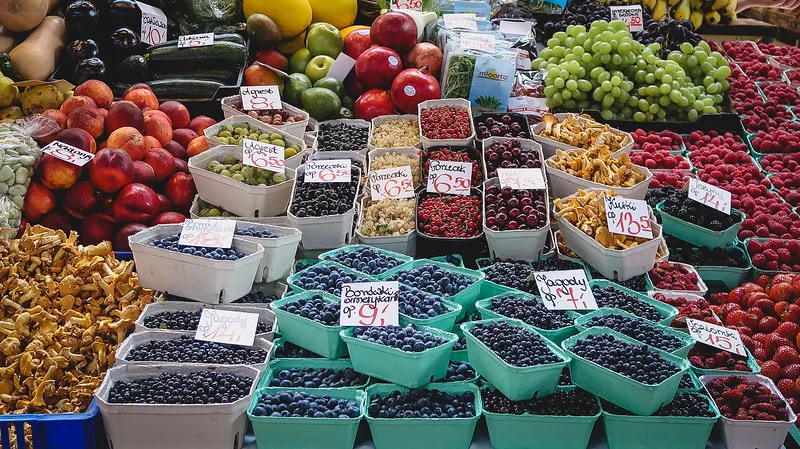 Hala Targowa for fresh produce featuring an assortment of colorful fruits and vegetables on display in Wroclaw, Poland Hala Targowa for fresh produce featuring an assortment of colorful fruits and vegetables on display in Wroclaw, Poland