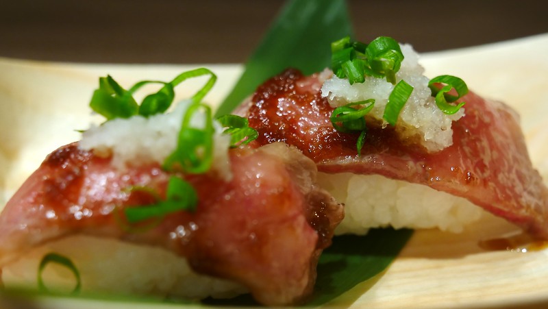 Hida beef nigiri is another popular food to try in Takayama, Japan. Hida beef nigiri is another popular food to try in Takayama, Japan.