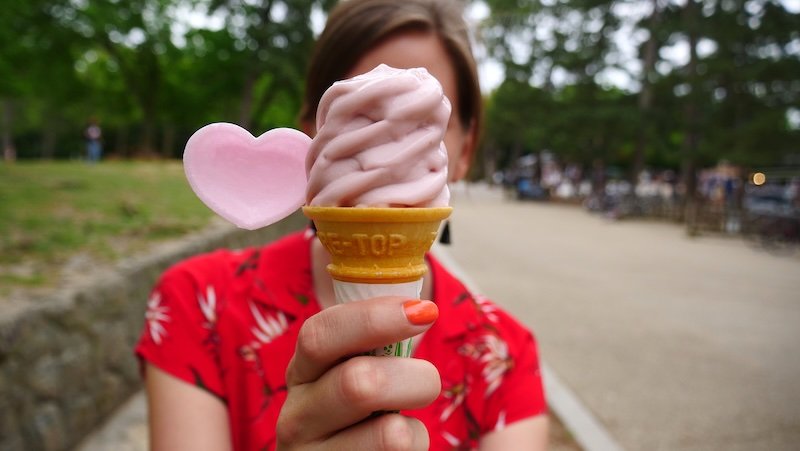 Hiding behind a sakura ice cream cone in Nara, Japan is That Backpacker Audrey Bergner Hiding behind a sakura ice cream cone in Nara, Japan is That Backpacker Audrey Bergner