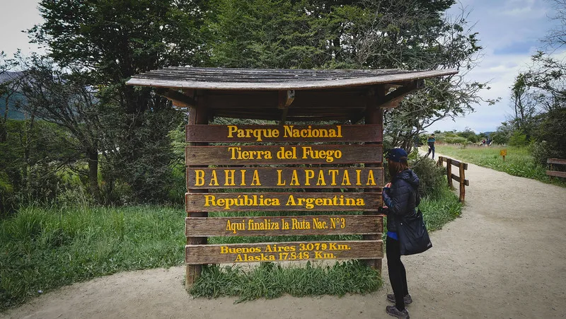 Hiking in Parque Nacional Tierra del Fuego signboard at Bahia Lapataia Hiking in Parque Nacional Tierra del Fuego signboard at Bahia Lapataia