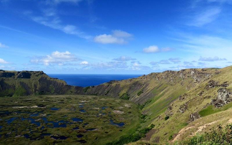Hiking Rano Kau and looking inside the volcano crater in the Easter Islands highlighting natural beauty and incredible geographical features