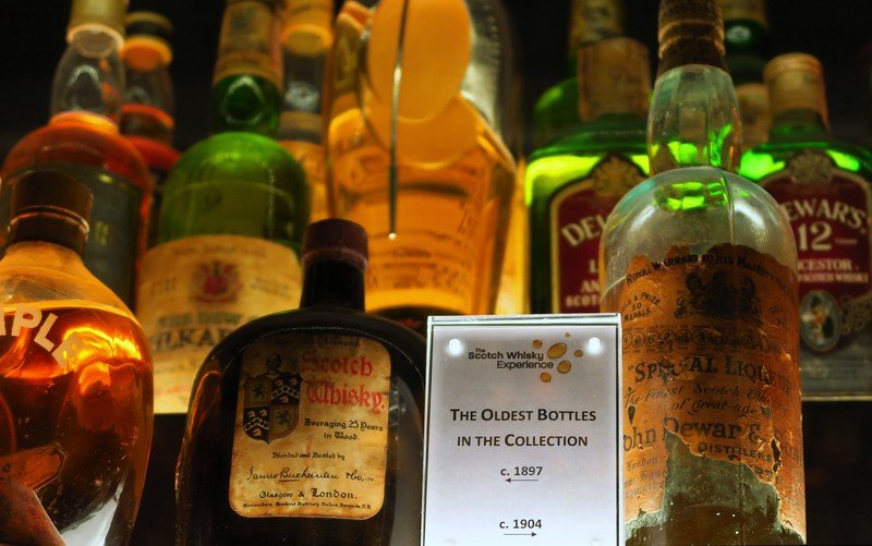 Historic Scotch whisky bottles from 1897 and 1904 on display at the Scotch Whisky Experience in Edinburgh, Scotland