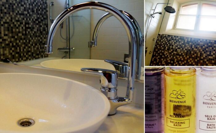 Collage of the modern bathroom at Hotel Katajanokka in Helsinki, Finland, featuring a stylish chrome faucet with ceramic sink, walk-in shower with mosaic tiles and arched window, plus luxury Bienvenue Paris bath amenities for guests to enjoy