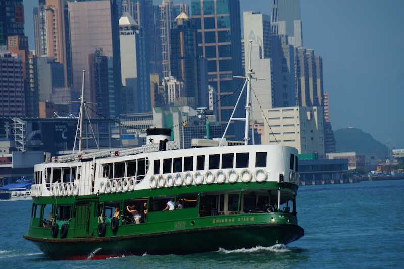 Iconic star ferry ride from Hong Kong Island to Kowloon is a local boat ride experience not to be missed for first time visitors 