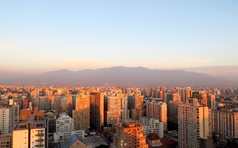 Incredible Santiago de Chile views from a high vantage point highlighting the city skyline and Andes mountain backdrop Incredible Santiago de Chile views from a high vantage point highlighting the city skyline and Andes mountain backdrop