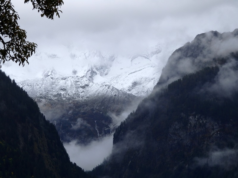 Incredible snow capped mountains towering in Chiavenna, Italy 