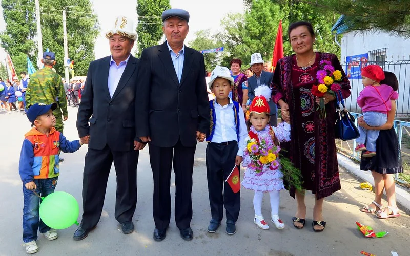 Independence Day celebrations in Kochkor, Kyrgyzstan with locals dressed up 