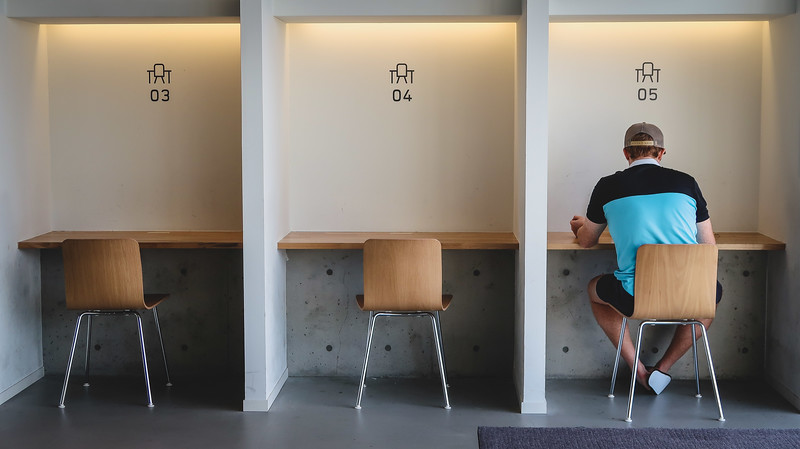 Individual working desks at 9 hours capsule hotel with Nomadic Samuel using workstation number five Individual working desks at 9 hours capsule hotel with Nomadic Samuel using workstation number five