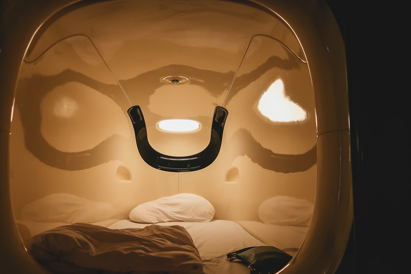 Inside the futuristic sleeping pod at 9 hours in Tokyo, Japan with nothing but a pillow, blanket and purse Inside the futuristic sleeping pod at 9 hours in Tokyo, Japan with nothing but a pillow, blanket and purse