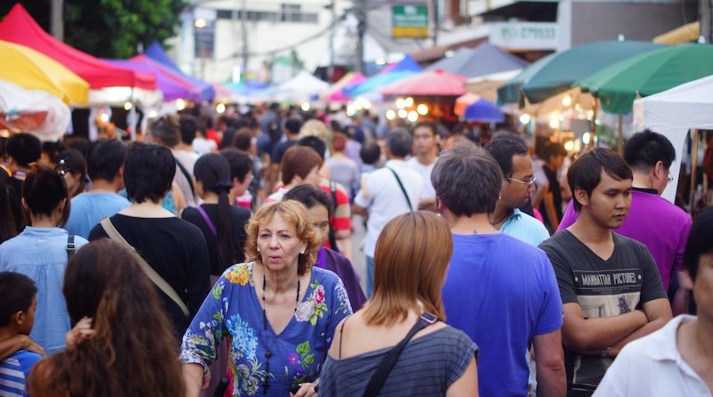 It gets crowded at the Chiang Mai Saturday Night Market even before it gets dark outside in Thailand 