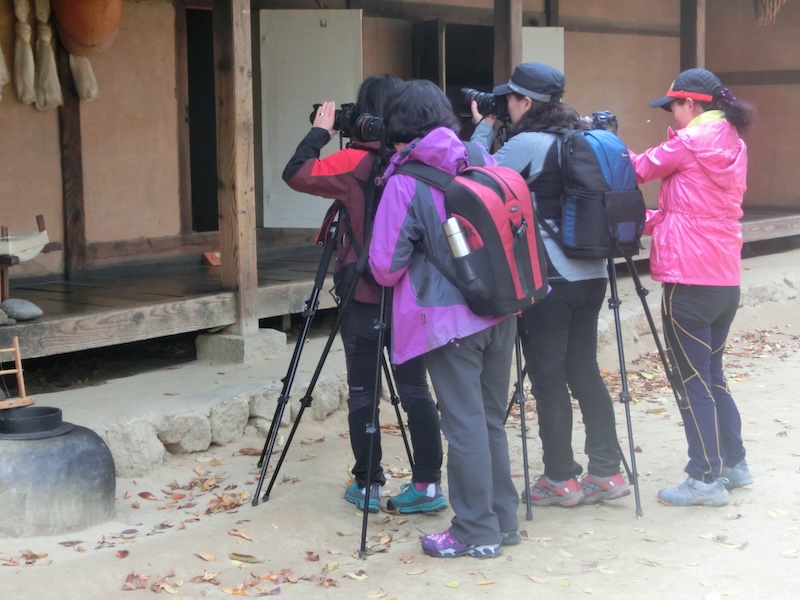 Korean hiking ajummas taking photos at the Korean Folk Village 