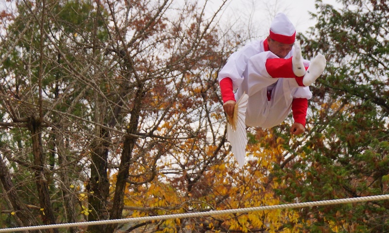 Korean man tightrope jumping on a rope in Yongin, Korea 