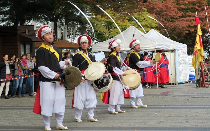 Korean traditional performers entertaining crowds in Namsan Tower also known as Seoul Tower in South Korea 