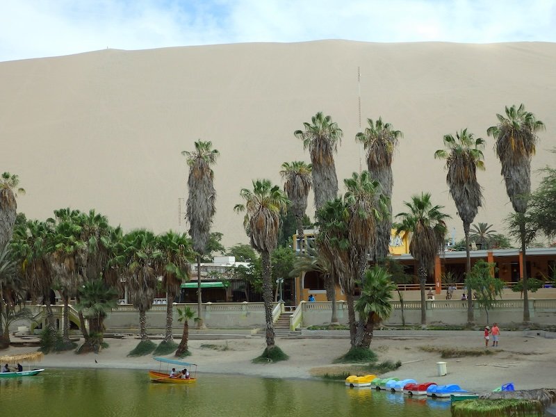 Lagoon area oasis boat rides in Huacachina, Peru 