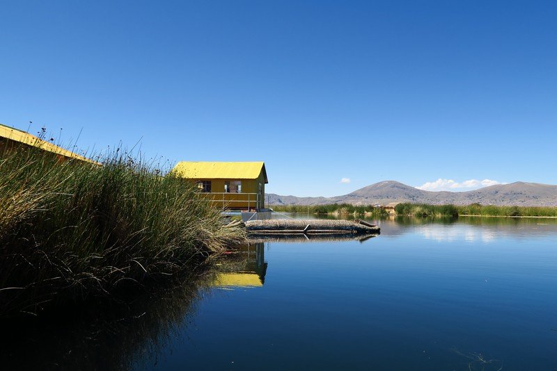 Lake Titicaca, Peru on a clear day with beautiful lake views is as pristine of a place as you can visit anywhere!