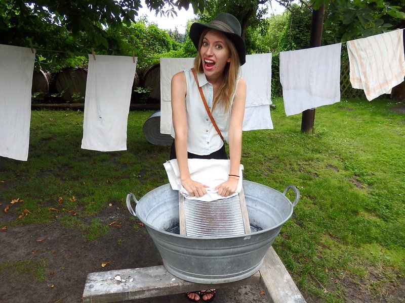 Learning about Sorbian culture and domestic duties in Germany with Audrey Bergner That Backpacker practicing washing clothes the old fashioned scrub way
