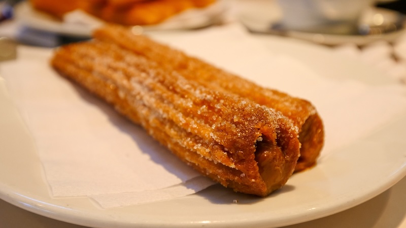 Legendary Manolo churros filled with dulce de leche manjar blanco in Miraflores, Lima, Peru 