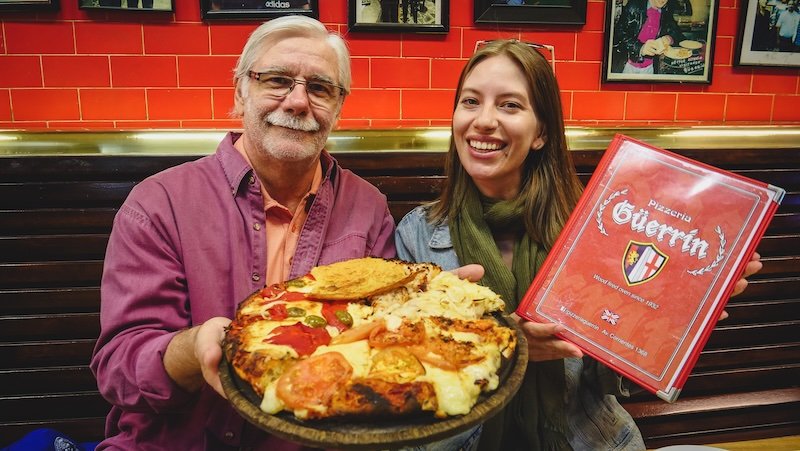 Legendary pizza in Buenos Aires, Argentina on offer as presented by That Backpacker Audrey Bergner and her father Daniel at pizzeria Guerrin 