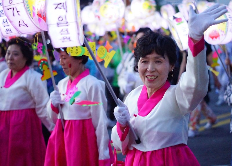 Lotus Lantern Festival is a bucket list item in Seoul, Korea with ladies wearing hanbok 