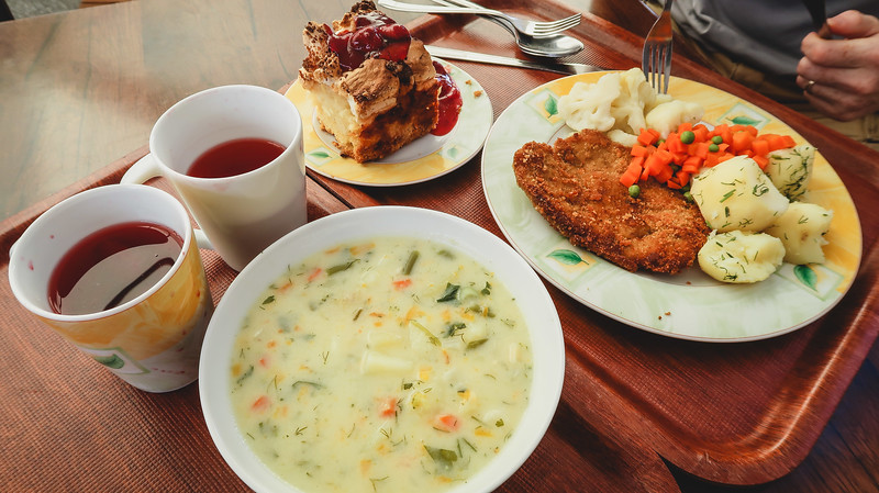 Lunch at Neptune's Milk Bar in Gdansk, Poland with a full serving of hearty dishes, soups, desserts and drinks