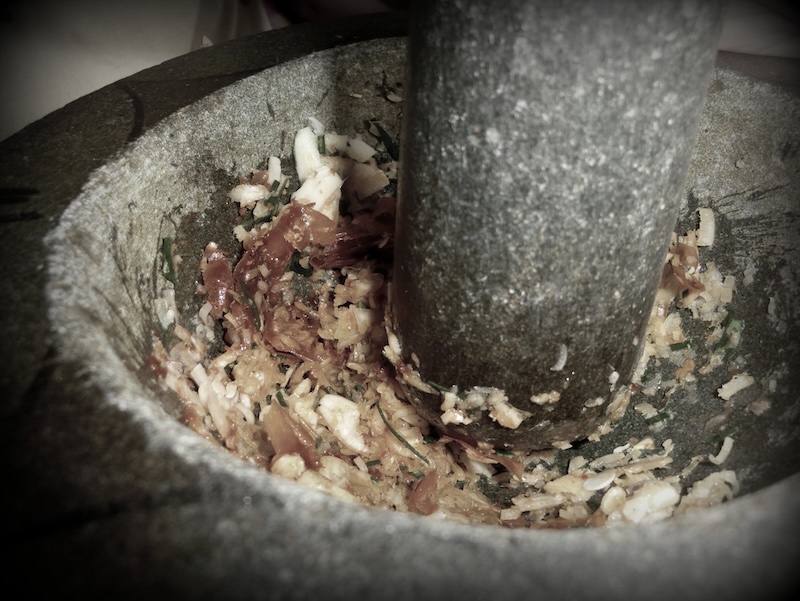Macro views of crushing local ingredients during cooking class in Battambang, Cambodia 