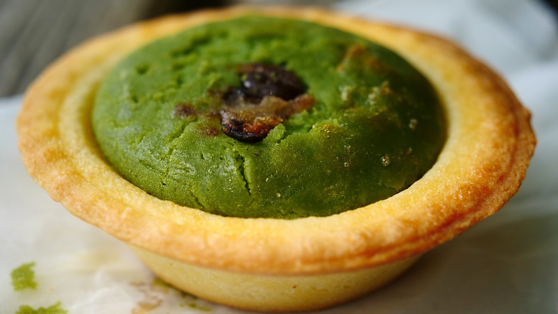 Matcha Cheese Tart on Mount Takao with a buttery pastry outer layer with red bean paste and matcha flavoured cheesecake rounding things out