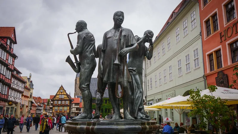 Musician sculptures playing music at Market Square in Quedlinburg Musician sculptures playing music at Market Square in Quedlinburg
