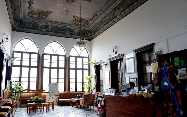 Nazareth Fauzi Azar Inn reception and lounge area in Israel with spacious ceilings and beautiful windows 
